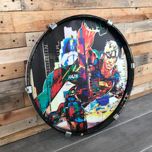 Laden Sie das Bild in den Galerie-Viewer, Supermann-Collage - Pop-Art von Stefanie Pappe-Stellbrink als Kunstdruck auf einem Schlagzeugfell